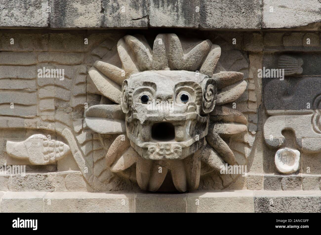 Feathered Serpent stone head in the Temple of Quetzalcoatl in Teotihuacan, a prehispanic Mesoamerican city located in the Valley of Mexico Stock Photo