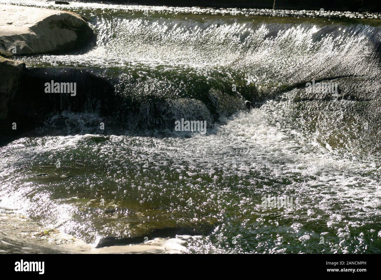 The Rocky River, in Olmsted Falls, Ohio, USA. Detail of waters flowing down. Stock Photo