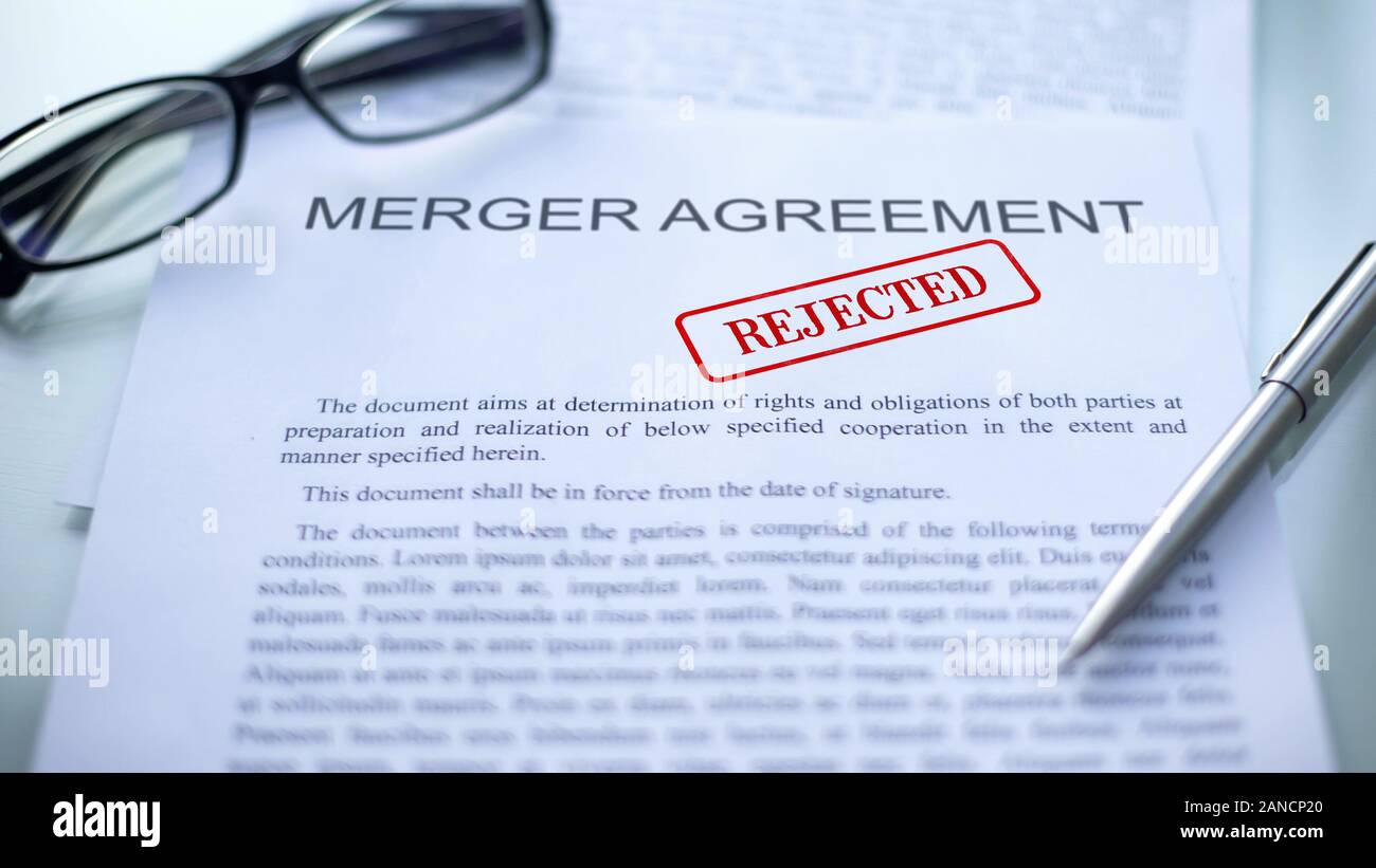 Merger agreement rejected, seal stamped on official document, business ...