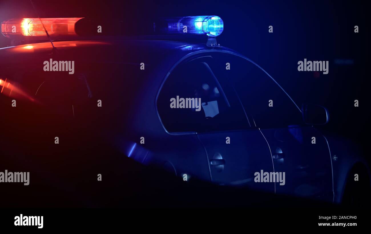 Black police car flash lights hi-res stock photography and images - Alamy