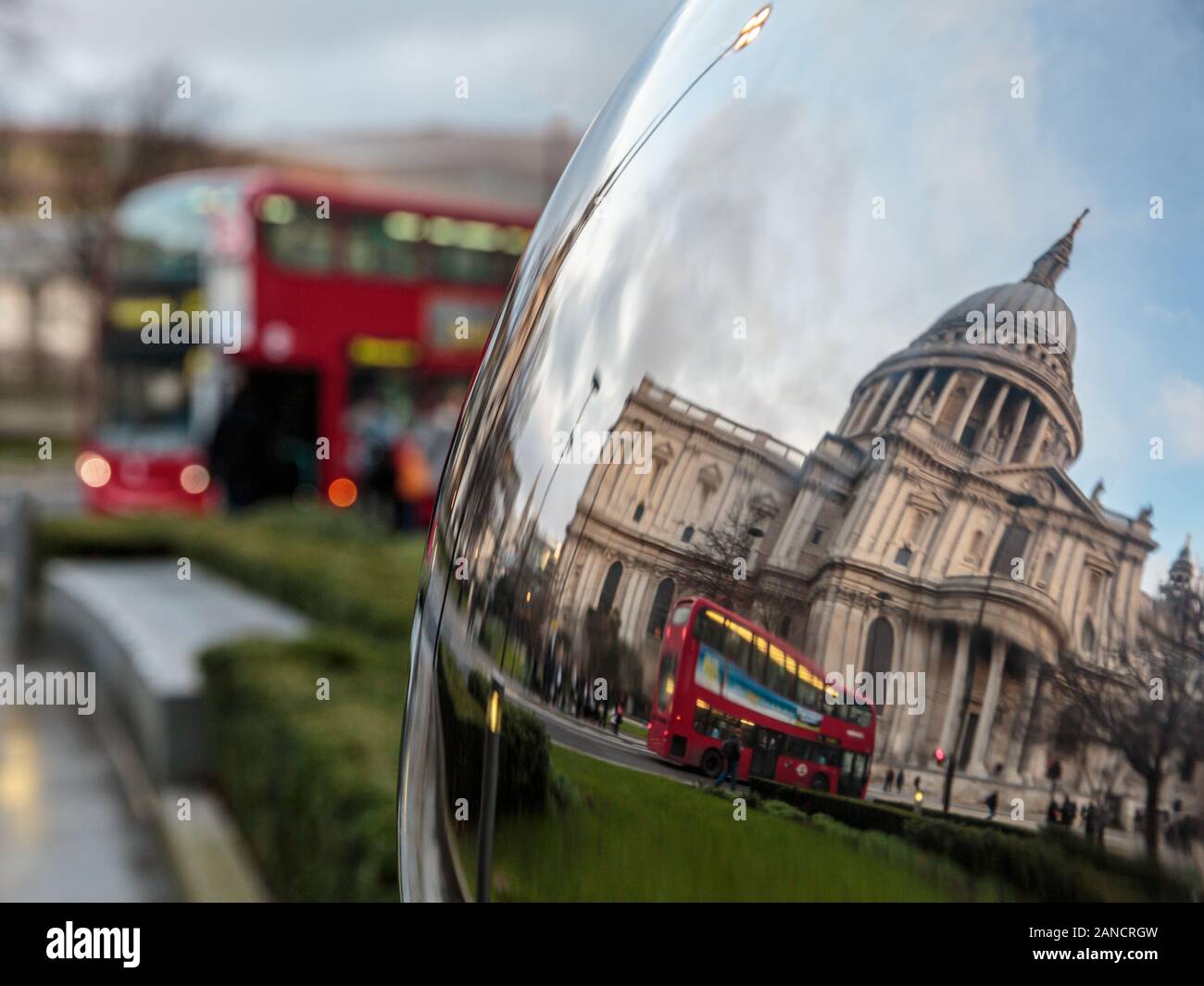 Art Reflection of St Paul's Cathedral and red London double-decker bus,  London, England, UK. Stock Photo