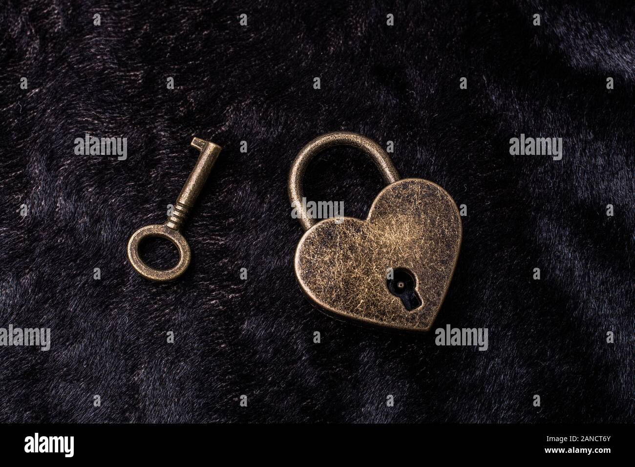Metal padlock in heart shape as symbol of love Stock Photo - Alamy
