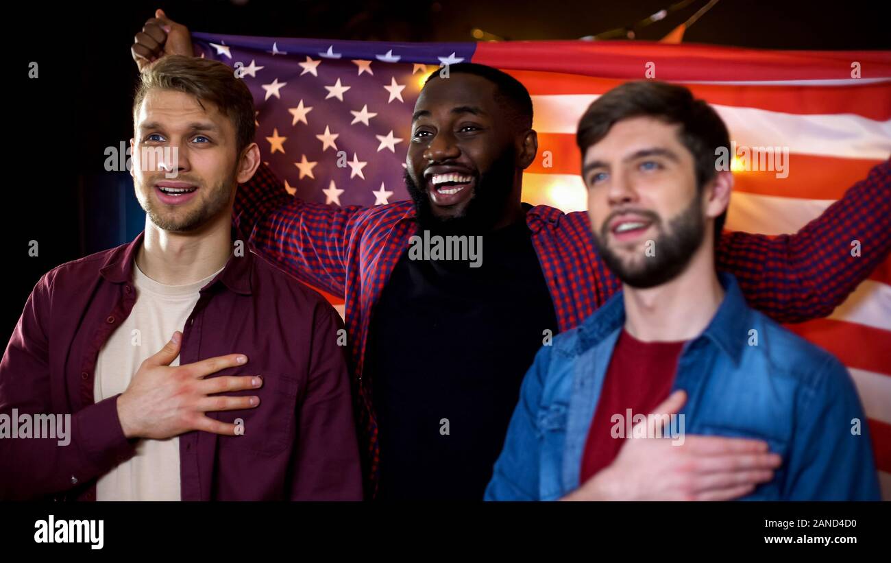 Football fans waving in pub hi-res stock photography and images - Alamy
