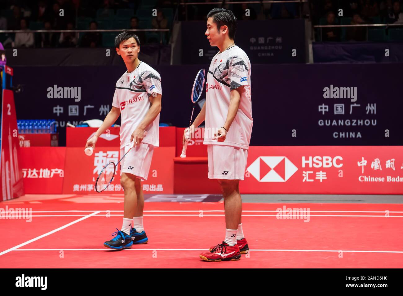 Japanese professional badminton players Hiroyuki Endo and Yuta Watanabe compete against Japanese