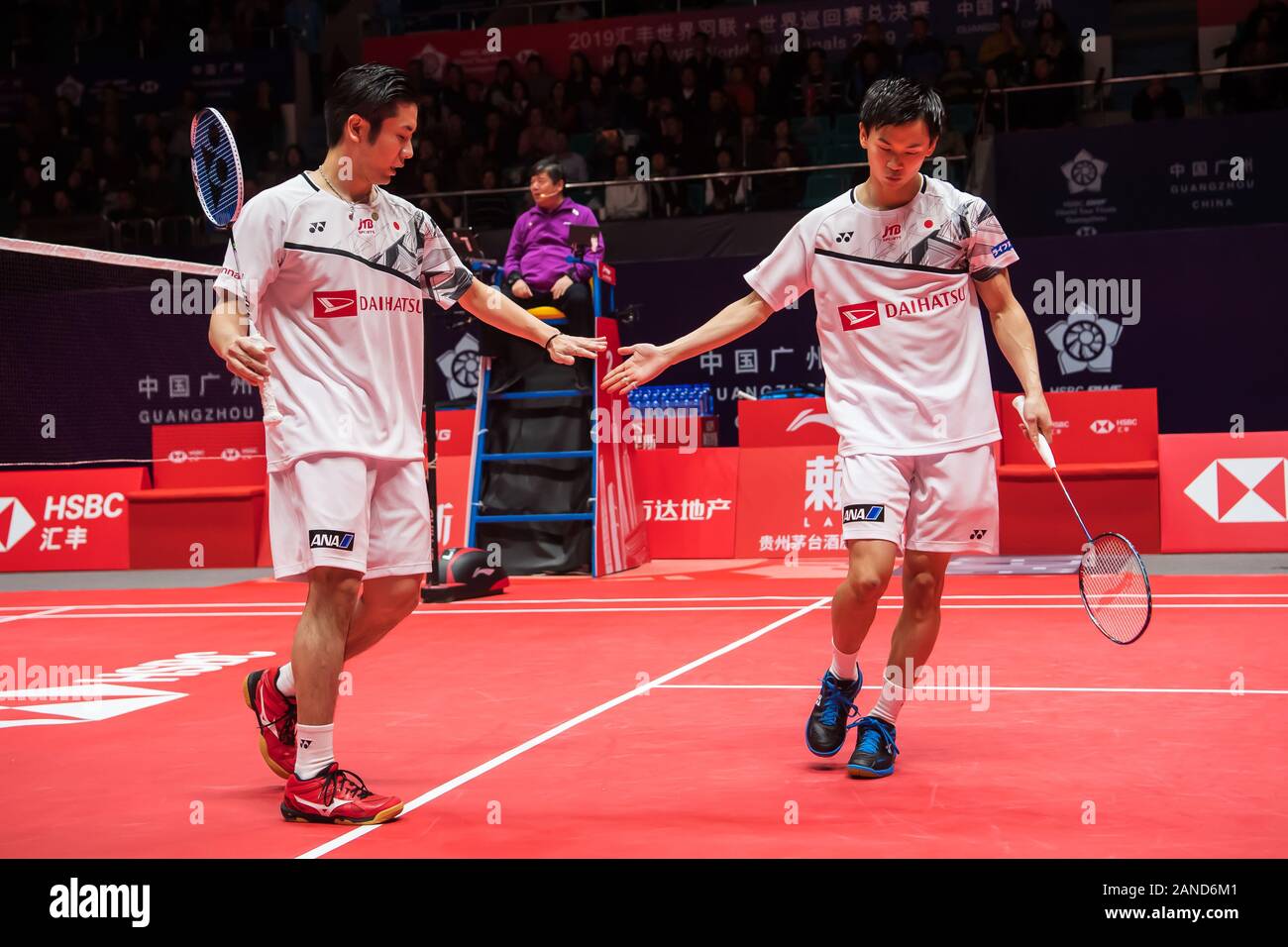 Japanese professional badminton players Hiroyuki Endo and Yuta Watanabe compete against Japanese