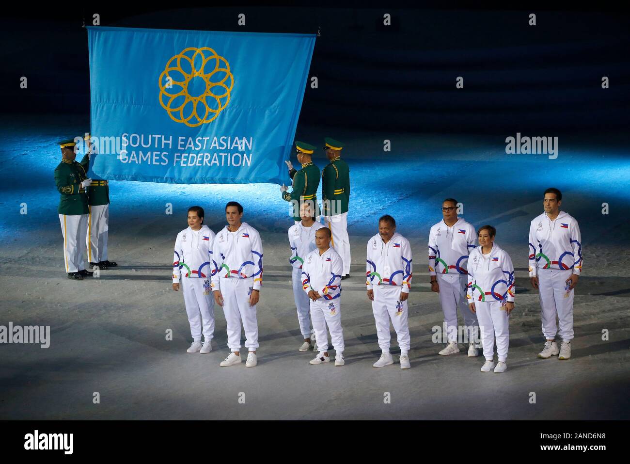 The Philippines Former Athletes Hold Flags During The Opening Ceremony 