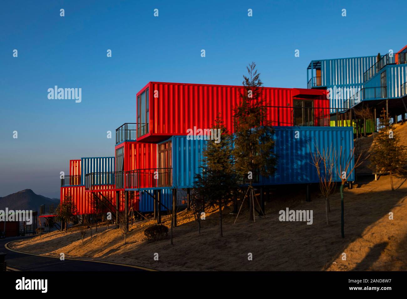 A colorful container hotel, a hotel composed of various container and ...