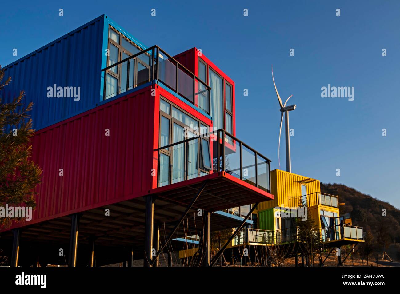 A colorful container hotel, a hotel composed of various container and ...