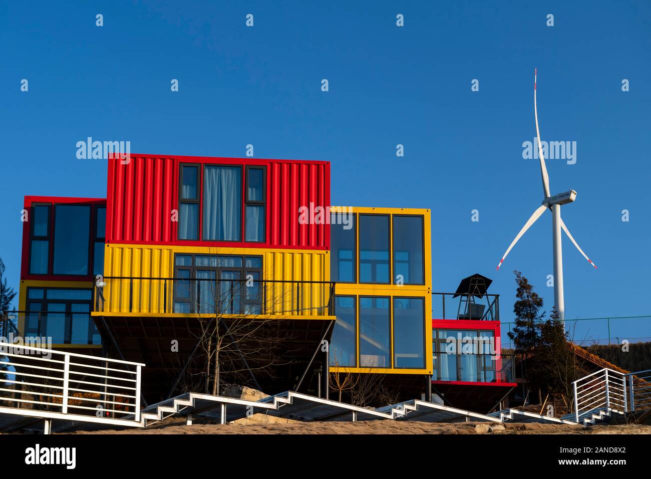 A colorful container hotel, a hotel composed of various container and ...