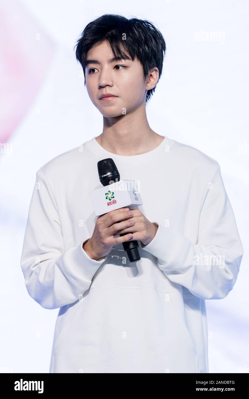 FILE--Chinese singer and actor Wang Junkai, also known as Karry Wang, the  leader of Chinese boy band TFBOYS, shows up at a promotional event in Shan  Stock Photo - Alamy