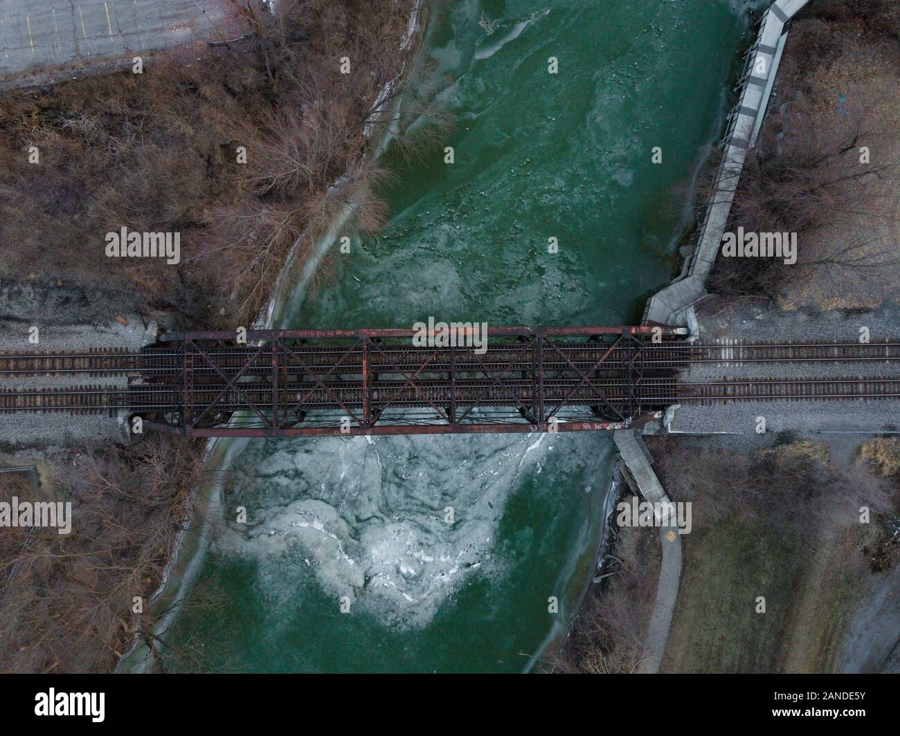 Bridge over frozen water Stock Photo