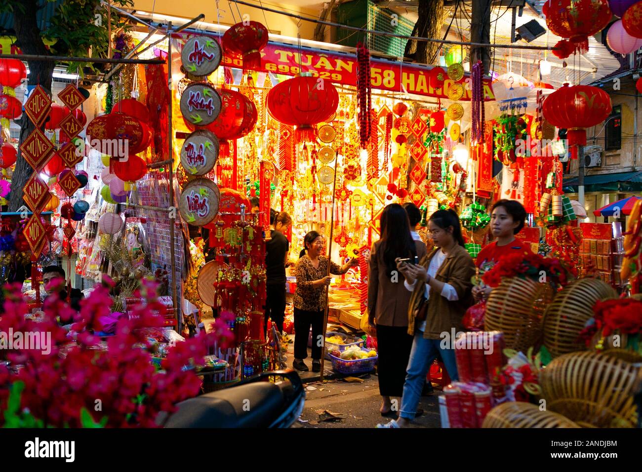 Hanoi Vietnam Jan 15 People Take A Walk Buying Decoration And Flower For Vietnamese Lunar New Year On Hang Ma Street Stock Photo Alamy