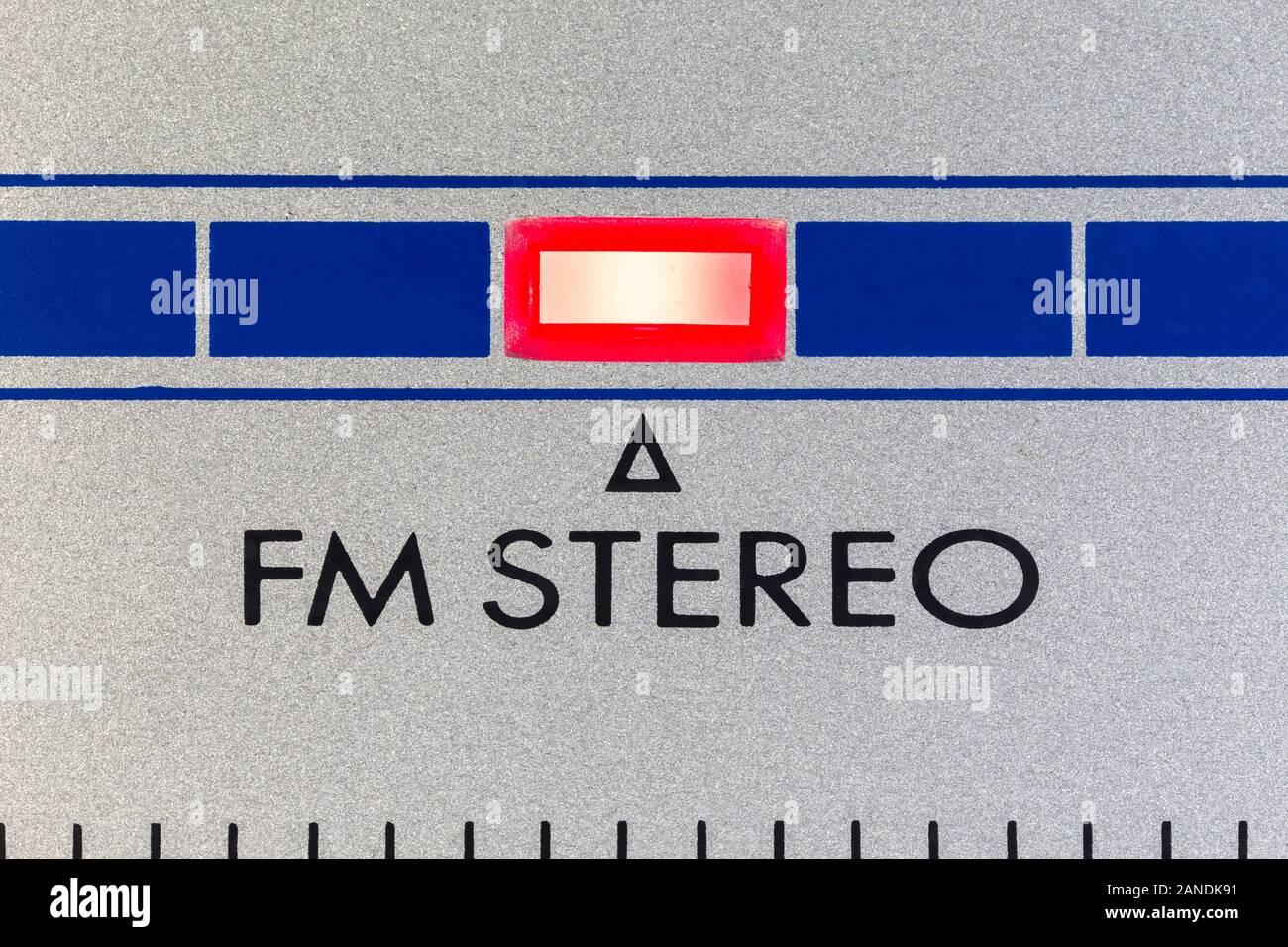 Macro close up photograph of FM Stereo indicator light on vintage boombox. Stock Photo