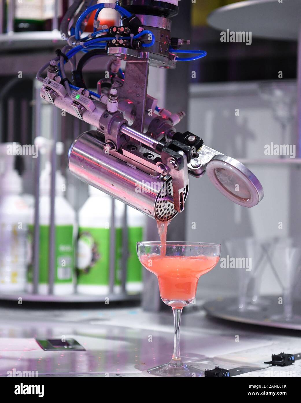 https://c8.alamy.com/comp/2ANE6TK/beijing-china-15th-jan-2020-photo-taken-on-jan-15-2020-shows-a-glass-of-cocktail-made-by-the-bartender-robot-at-a-smart-restaurant-in-guangzhou-capital-of-south-chinas-guangdong-province-credit-deng-huaxinhuaalamy-live-news-2ANE6TK.jpg