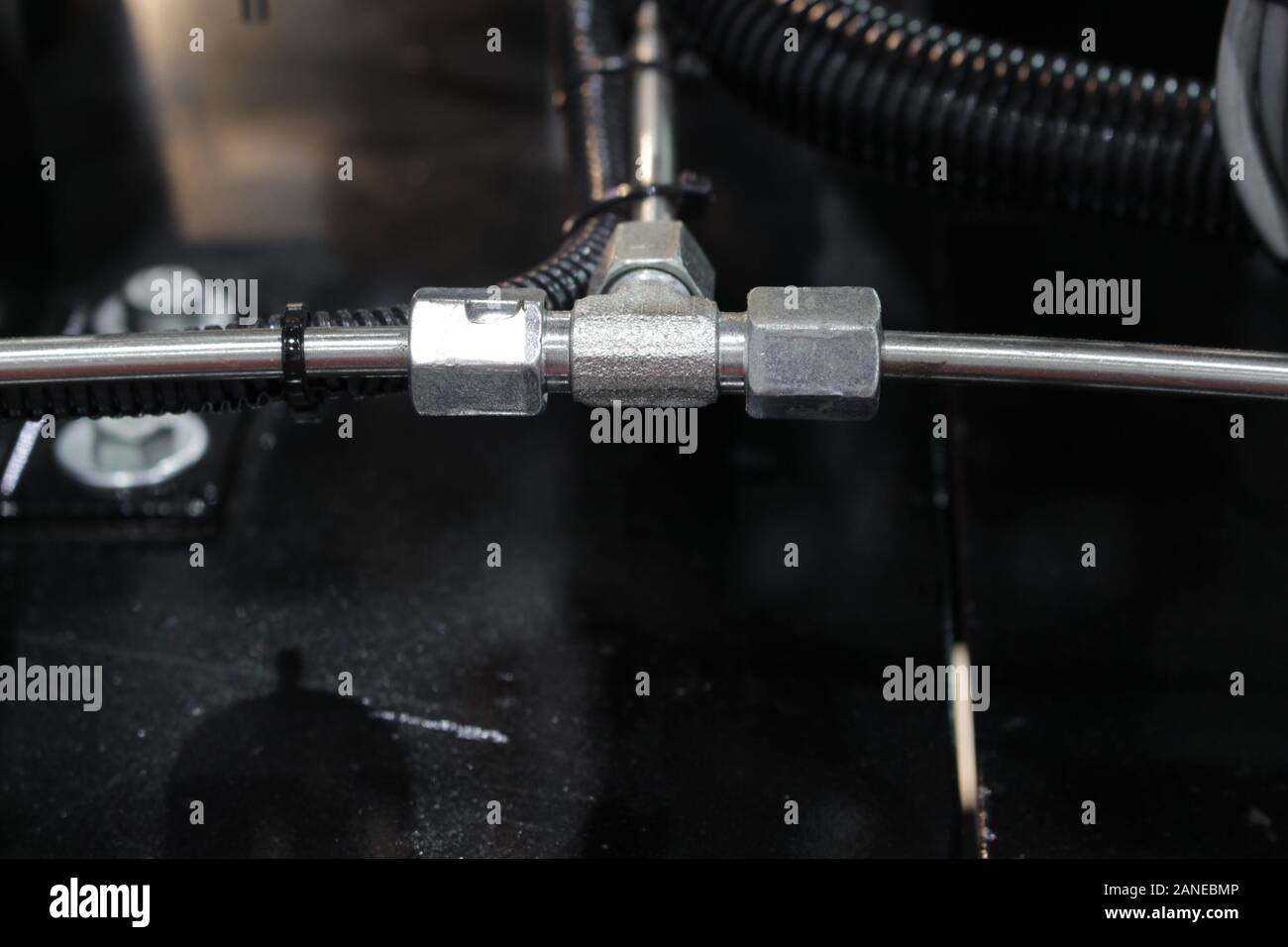 three junction of piping system in industrila machine ; engineering equipment background ; close up Stock Photo