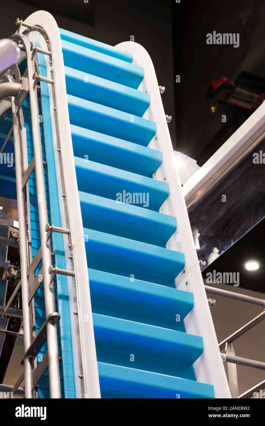 Plastic bucket elevator outlet