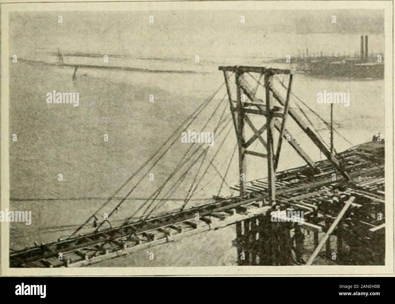 Engineering and Contracting . he trunnion for the north half of the spanwas supported by a double bent of 12 cypress piles, cappedand braced. The towers were 12x12 timbers, fitted withordinary timber derrick mast shoes, and were braced with3xl0s and 6x8s. The leaves of the bridge consisted of 47-ft. timbers,carrying ties and rails for the construction railway, andbraced laterally with 3xl0s bolted to the under side of the 369 THE DESIGN OF STEEL STACKS. Stack design in many cases has been carried out by acut and try method which might or might not involvemany trials before a solution was reach Stock Photo