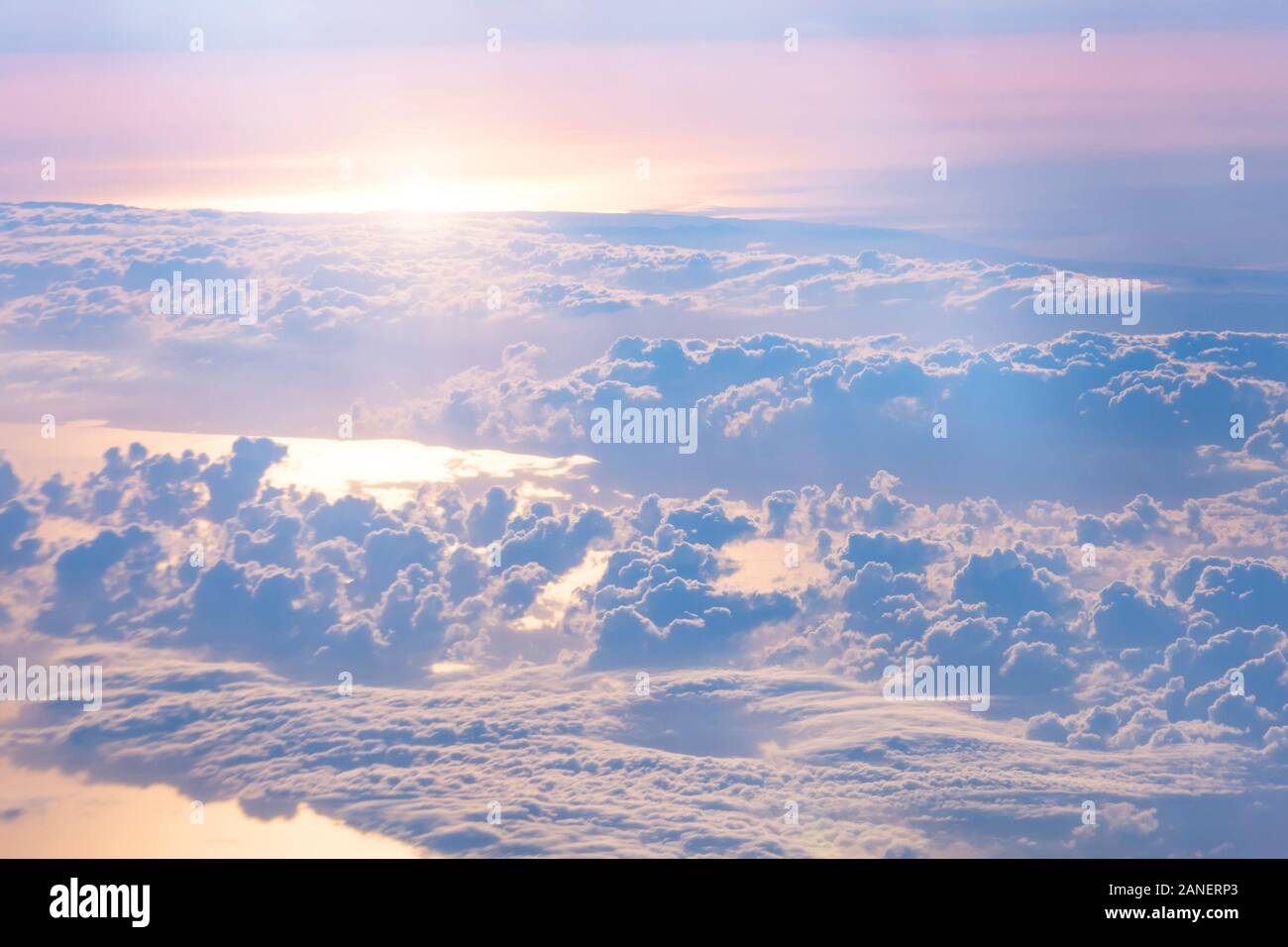 Aerial view of cumulus clouds over the ocean and sunshine Stock Photo ...