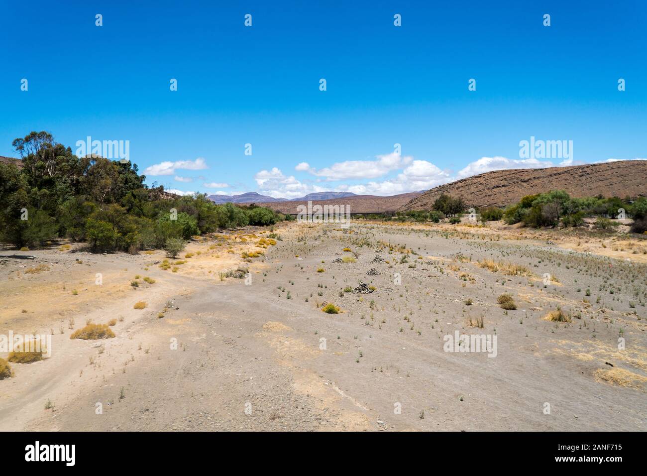 dry river bed of the Buffels River in Laingsburg, Karoo, South Africa showing devastation of drought, water shortage, climate change, global warming Stock Photo