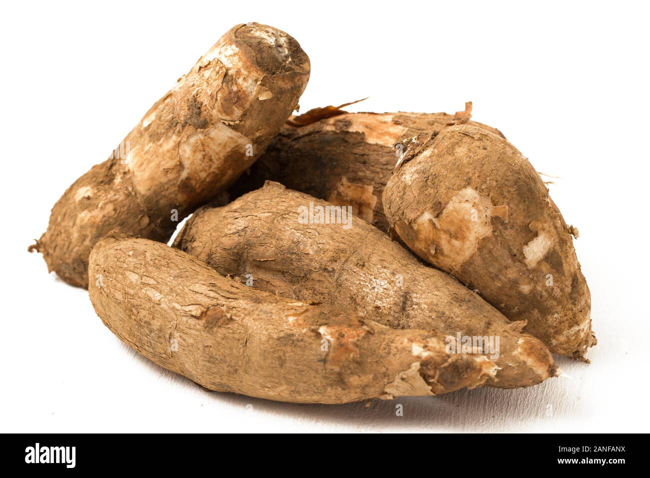 Fresh Cassava root isolated on a white background Stock Photo Alamy