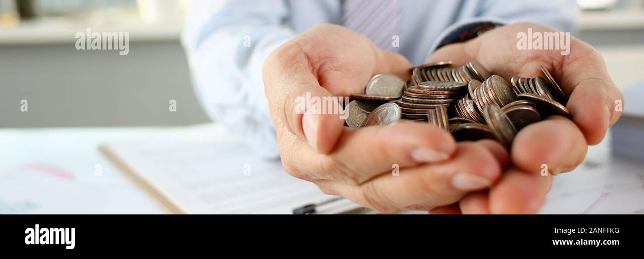 Hand businessman putting pin money Stock Photo Alamy