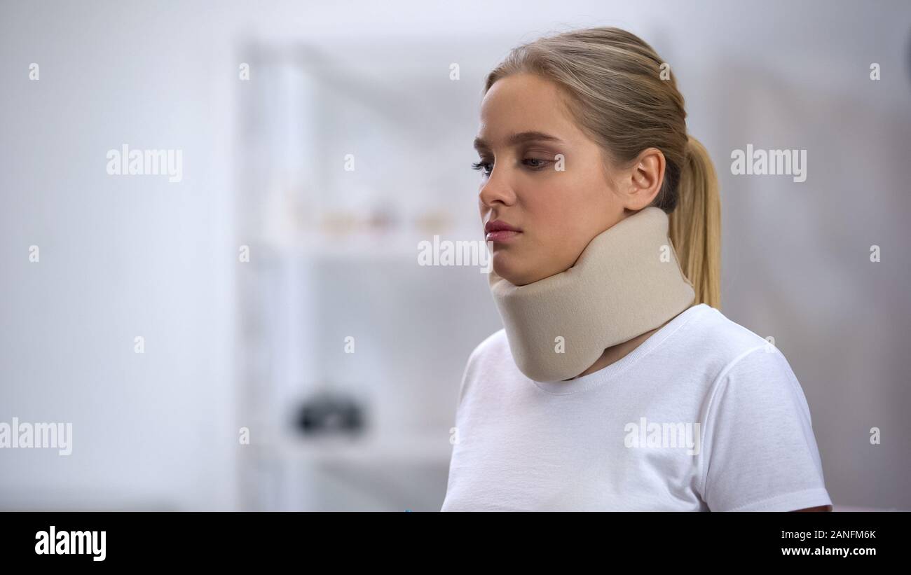 Upset Girl Wearing Neck Collar Sprain And Therapy Concept 