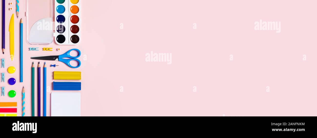 Web Banner With School And University Supplies On Pink Background