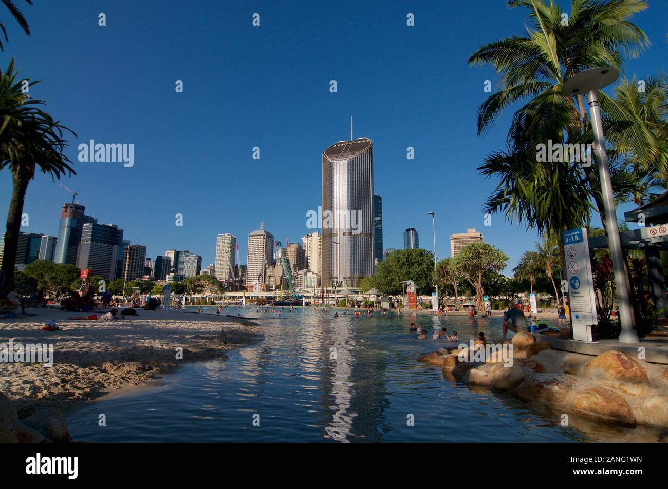 Brisbane, Queensland, Australia - 17th December 2019 : View of South Bank artificial street beach and pools on a sunny day with many tourists enjoying Stock Photo