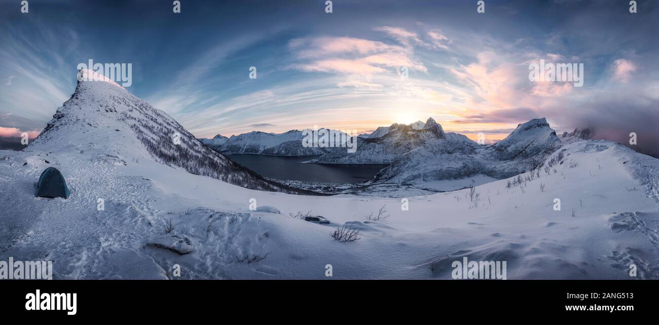 Panorama of Hiking on snowy mountain range in sunrise on Segla peak at  Senja Island, Norway Stock Photo - Alamy, image size:1300x641