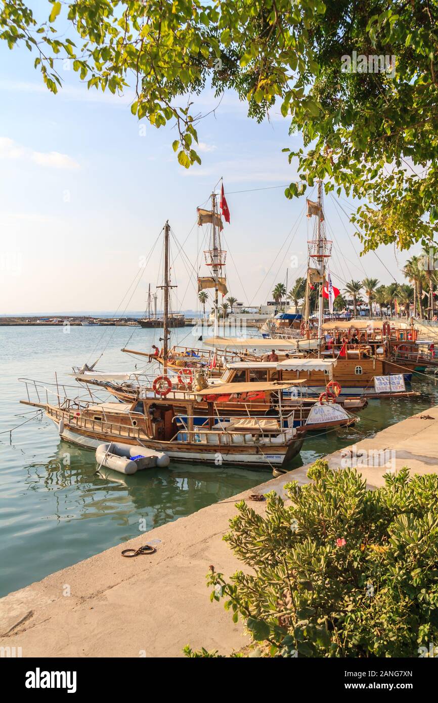 Side, Turkey - September 9th 2011: Traditional Turkish boats in the harbour. The town is a populat tourist destination. Stock Photo