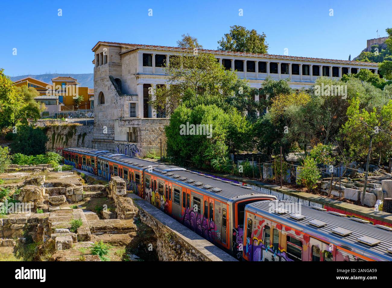 Train running in the city of Athens, Greece Stock Photo