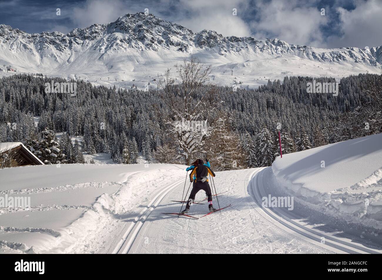 cross-country skiing with skate technique in Switzerland Stock Photo