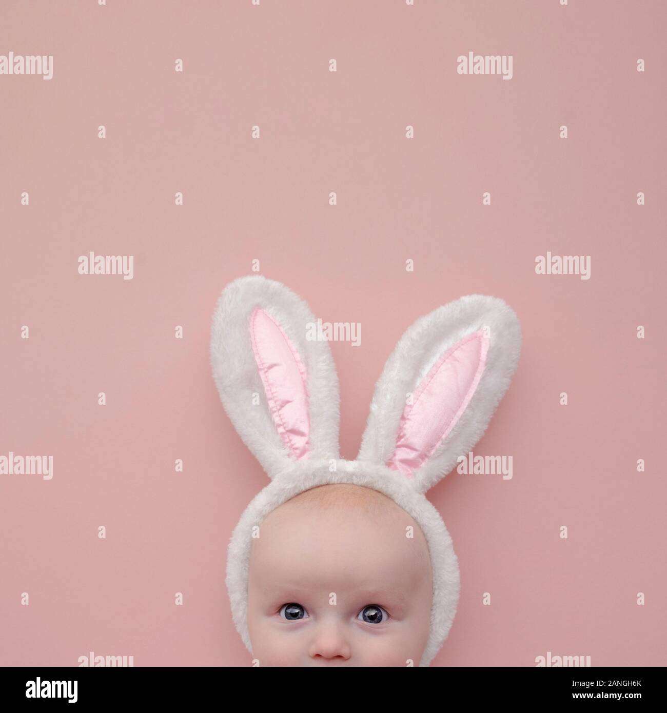 Baby dressed as bunny deals