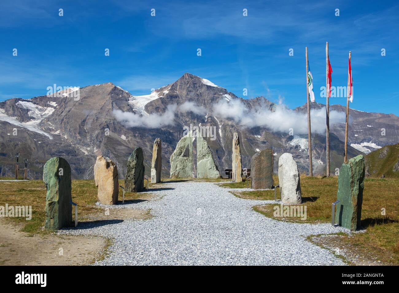 View point near Haus Alpine Naturschau, Großglocknerstraße. Rocks and flags. Großes Wiesbachhorn peak. Austrian Alps. Europe. Stock Photo