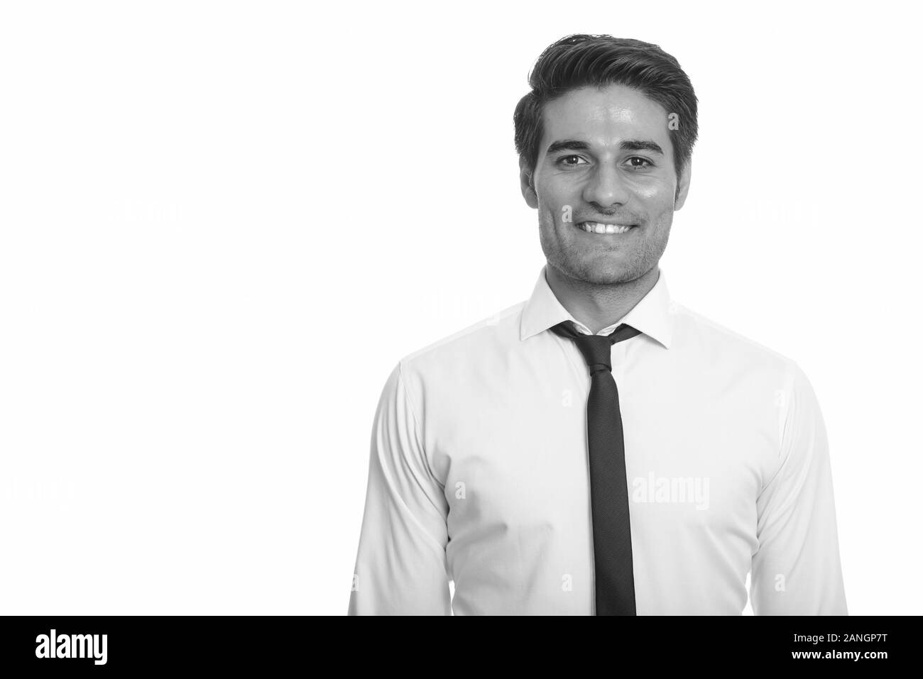 Portrait of happy young handsome Persian businessman smiling Stock ...