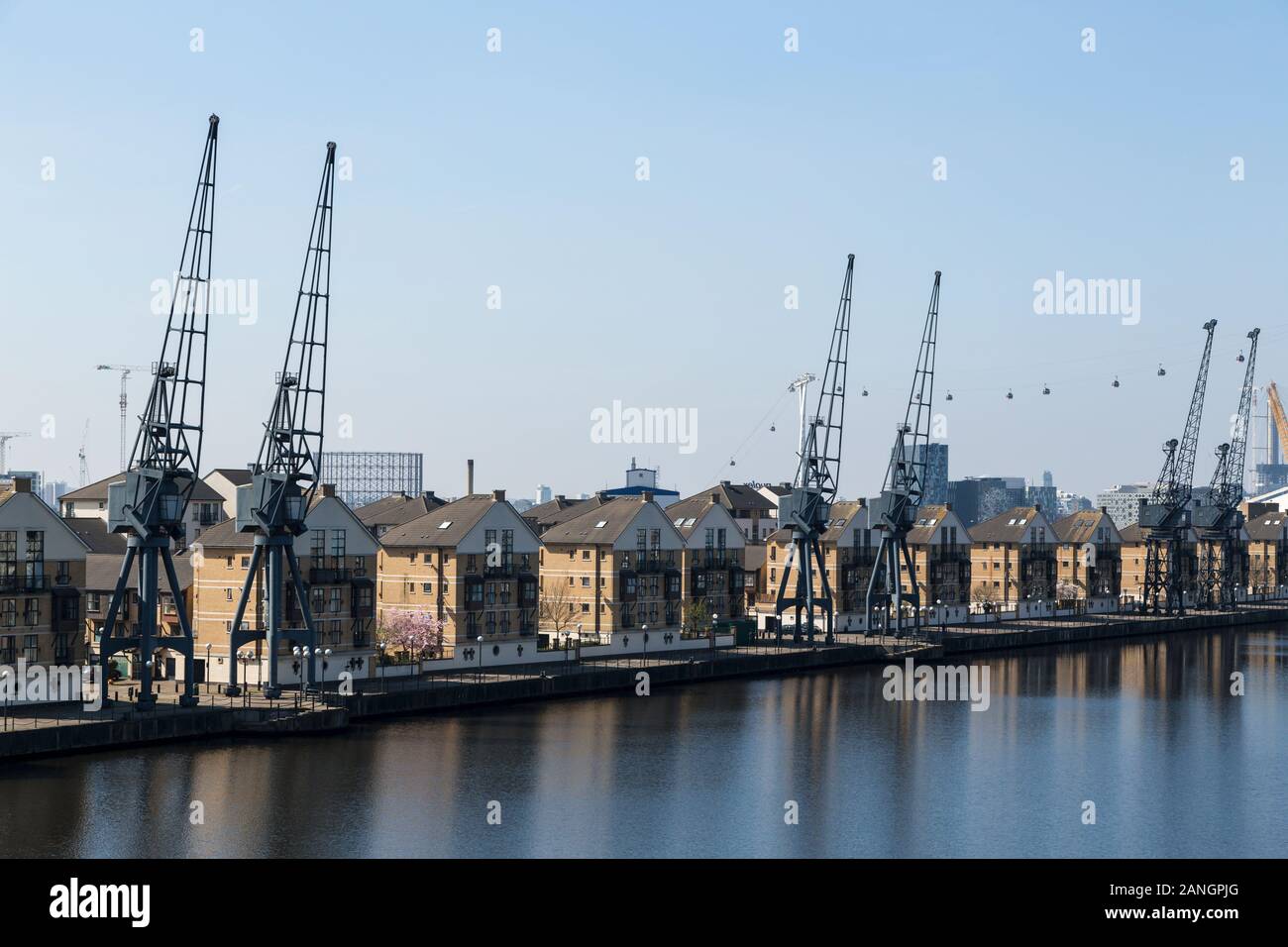Waterfront houses in London docklands, Emirates Cable car, England Stock Photo