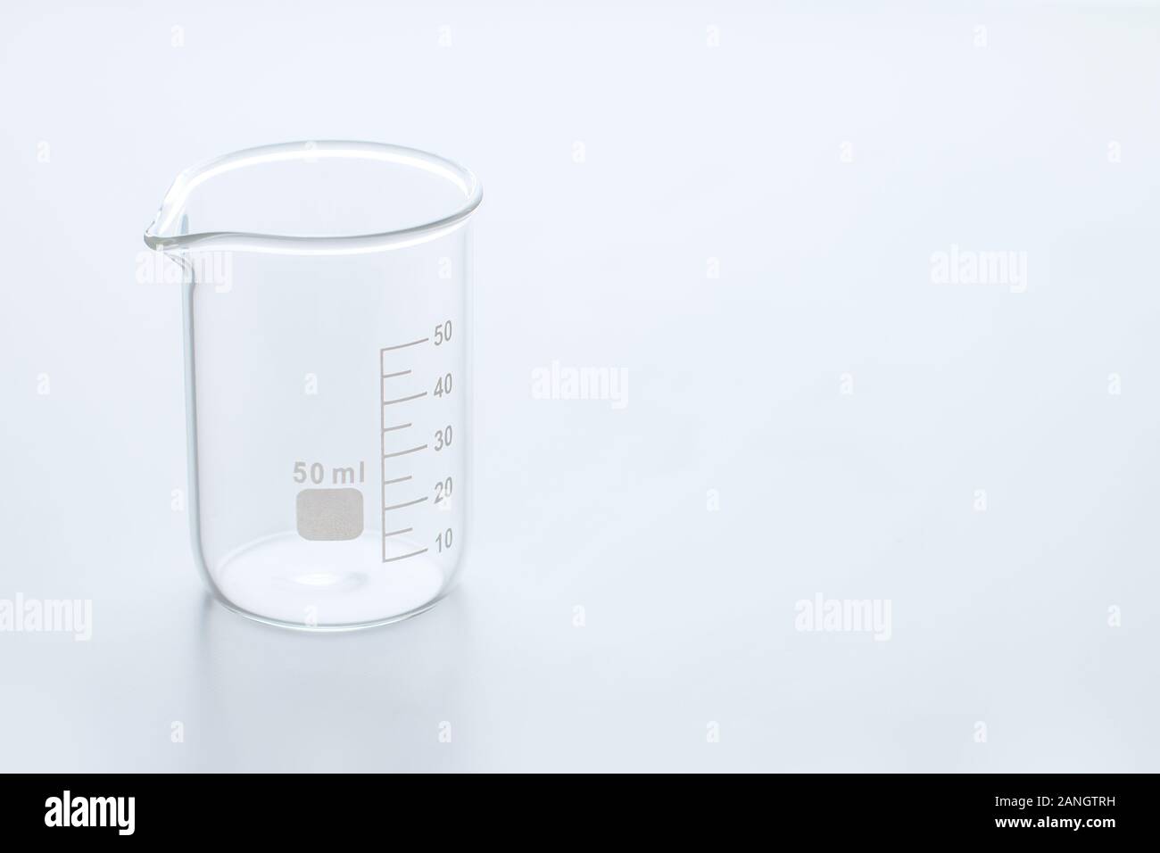 https://c8.alamy.com/comp/2ANGTRH/an-empty-transparent-glass-50-ml-beaker-on-a-white-background-2ANGTRH.jpg