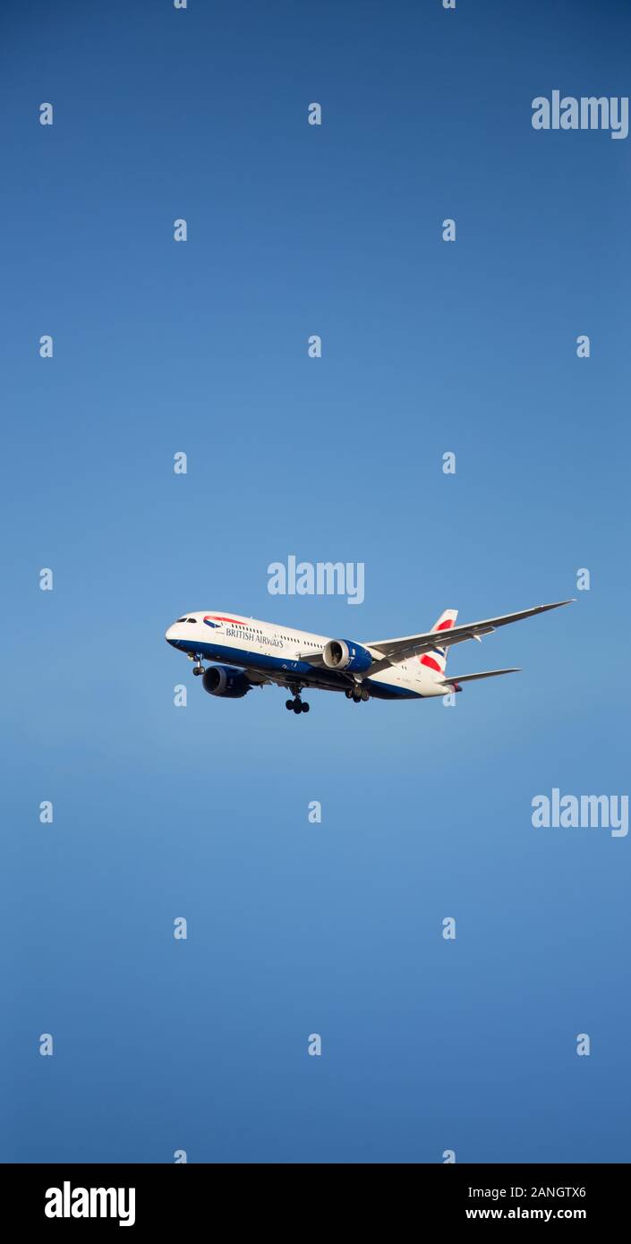 Commercial airplane Boeing 787 of British Airways landing at the Heathrow airport. Stock Photo