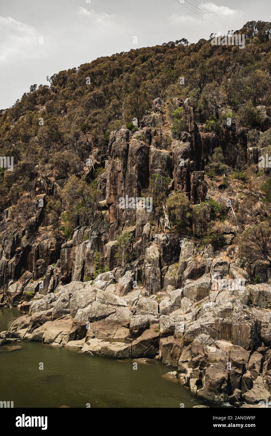 Old rock formations along the South Esk River on the Cataract Gorge walk. Stock Photo
