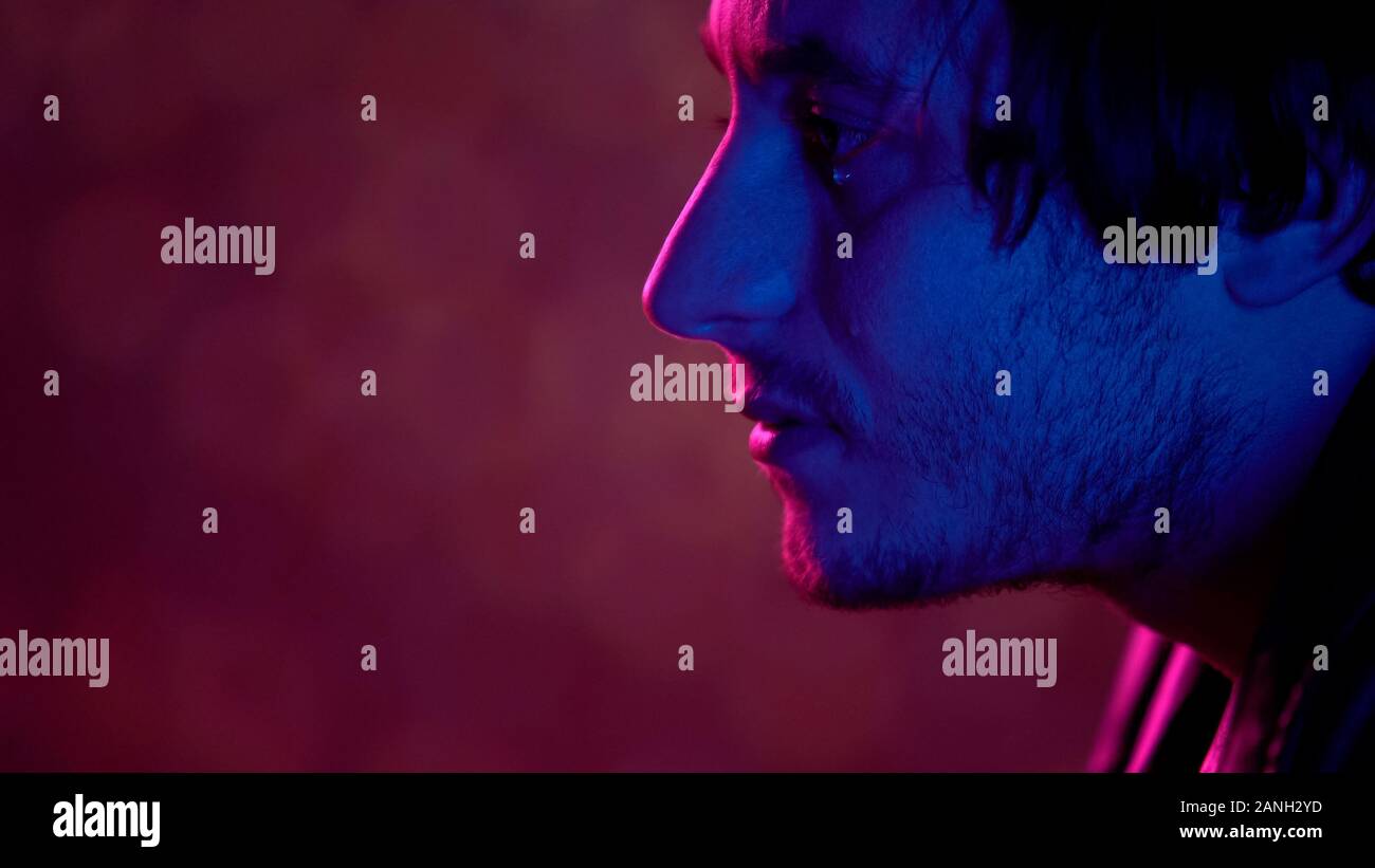 Depressed guy crying in plane hi-res stock photography and images - Alamy