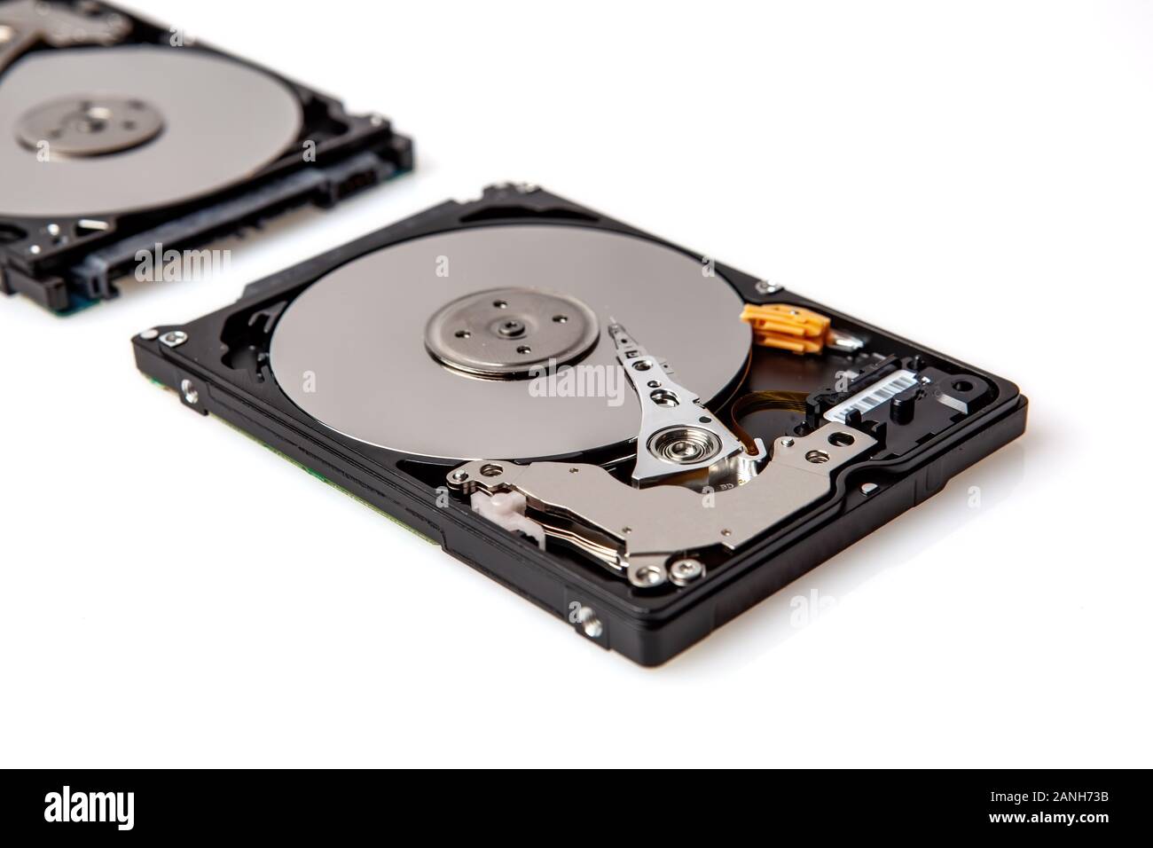 Porotable 2.5 inch hard drives showing internal components on white