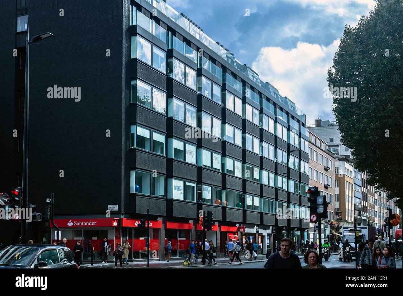 Front facade of a mid-rise office building on Tottenham Court Road, London, England, UK. Stock Photo