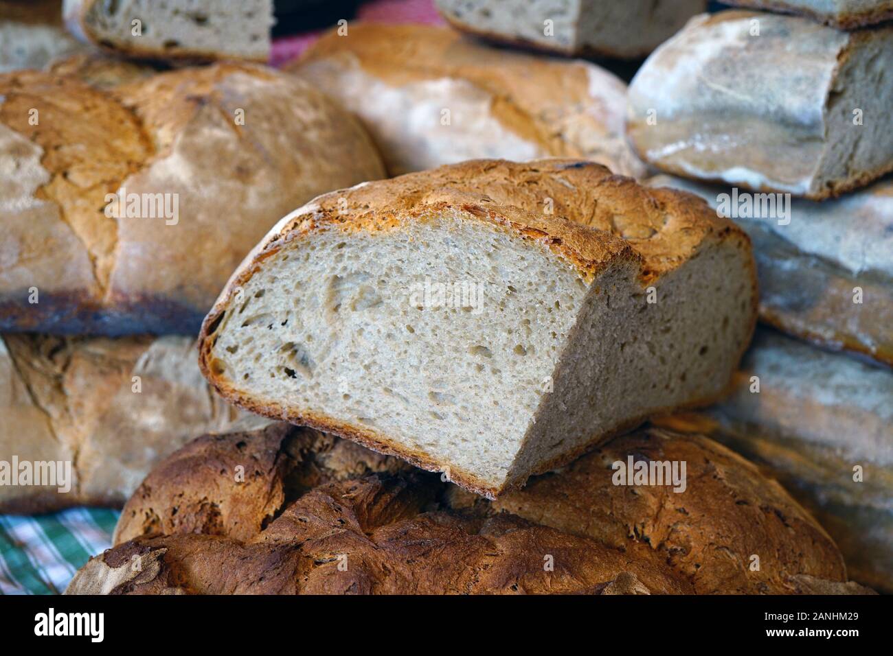 Rustic French sourdough bread at a market Stock Photo Alamy