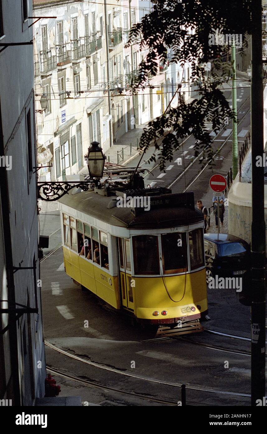 A TRAM IN ONE OF THE TYPICAL STREETS OF THE CITY LISBOA PORTUGAL - LISBOA TRANSPORT - LISBOA TRAM - LISBOA STREET PHOTOGRAPHY - SILVER IMAGE © Frédéric BEAUMONT Stock Photo