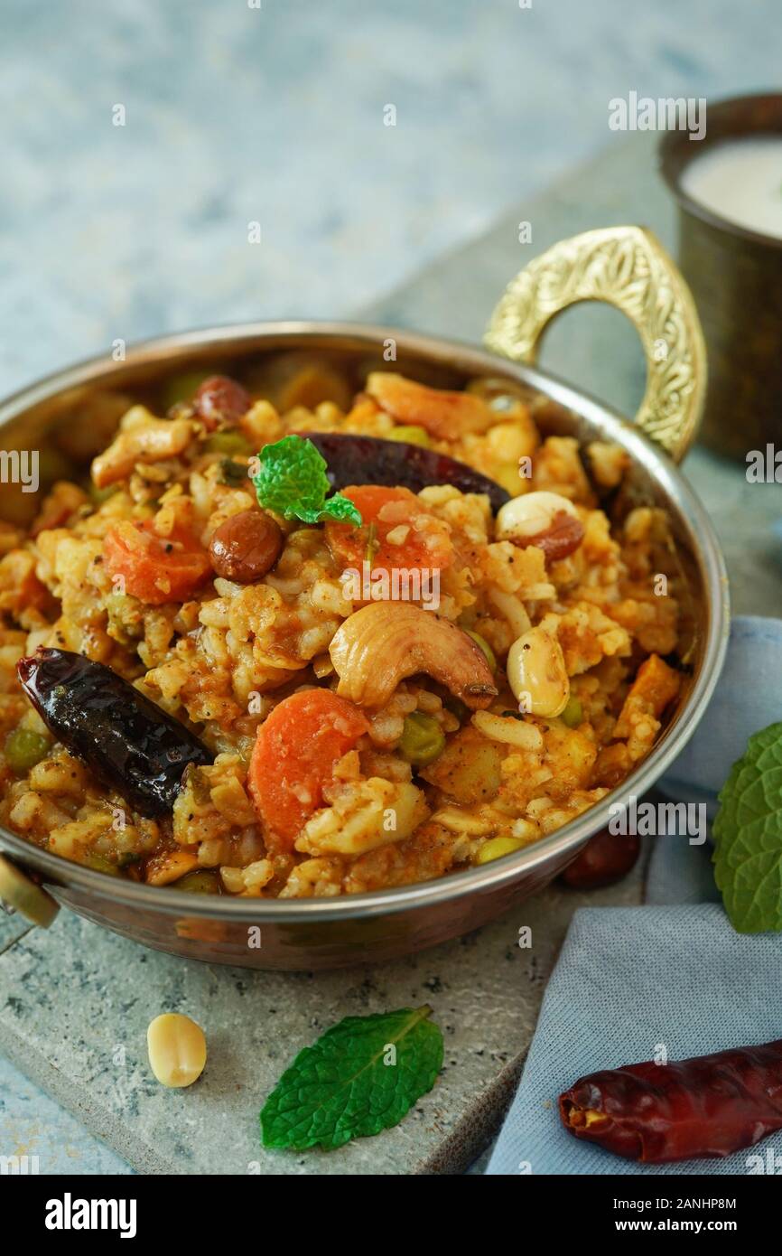 Bisi bele bath / Sambar rice- South indian rice lentil dish Stock Photo