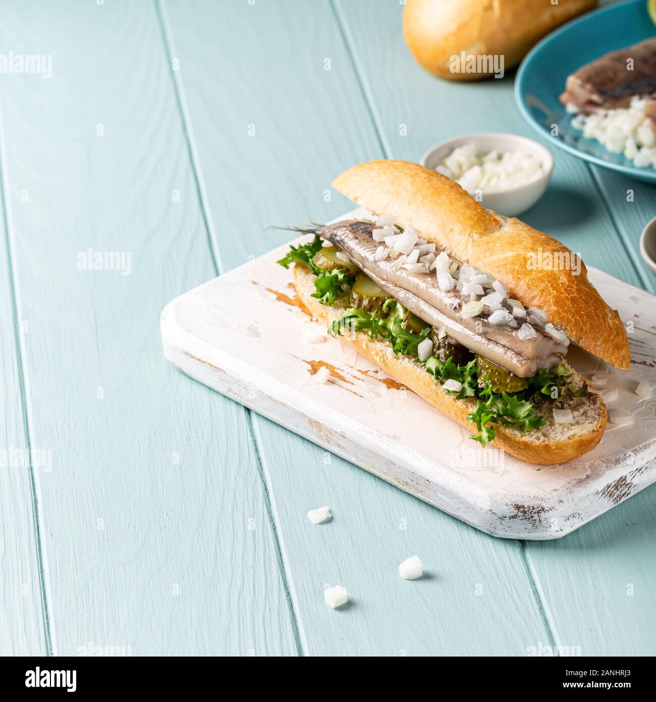Traditional dutch snack, seafood sandwich with herring Stock Photo Alamy