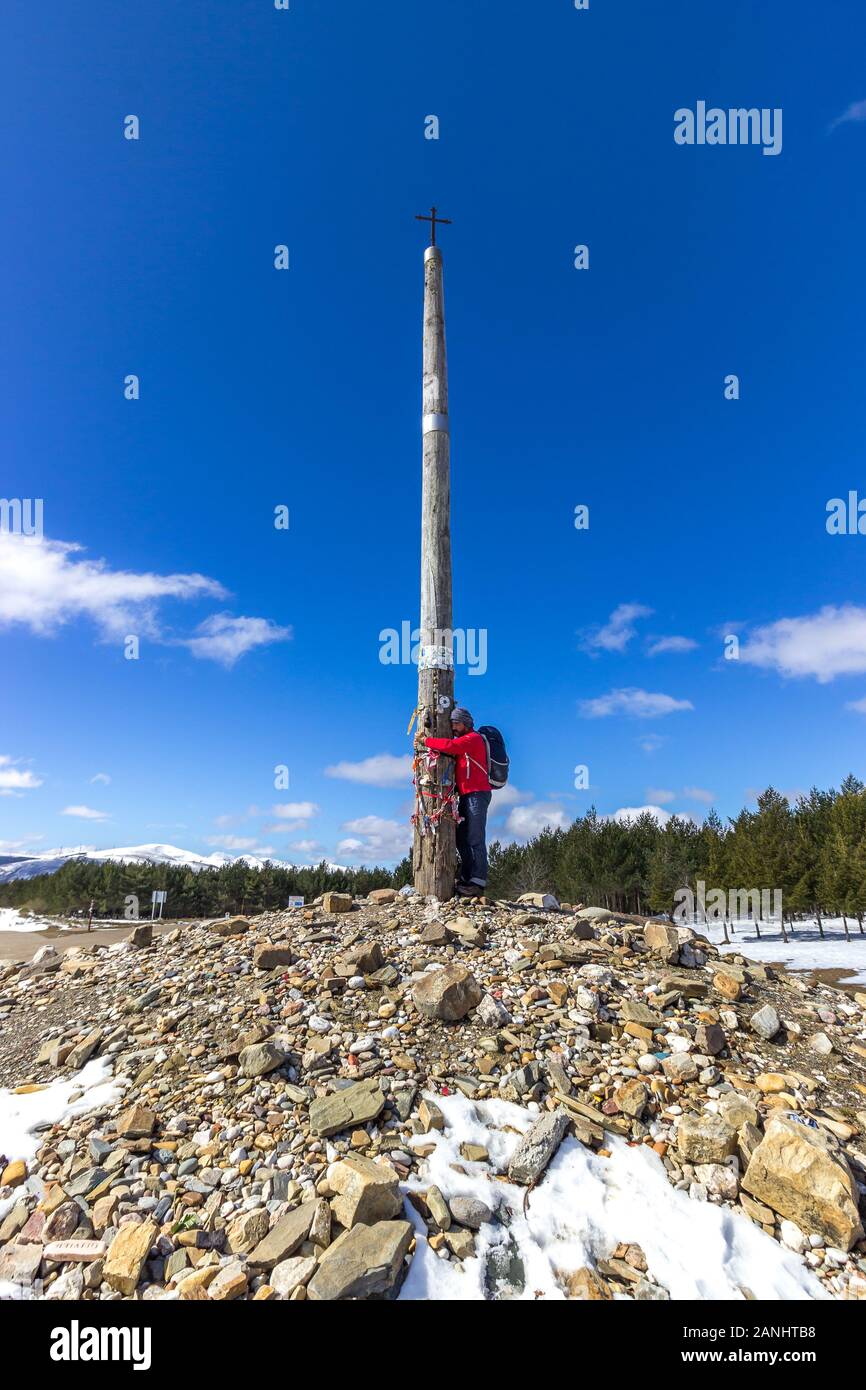 A Pilgrim Embracing the Iron Cross - Cruz de Ferro - the Highest Point ...