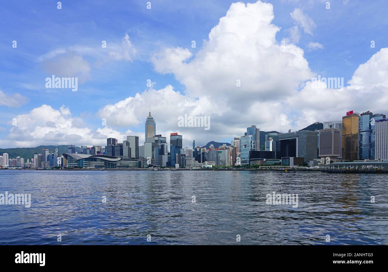 HONG KONG -29 JUN 2019- Day view the modern Hong Kong skyline near the Convention Center in Wan Chai and Central seen from the water in  Victoria Harb Stock Photo