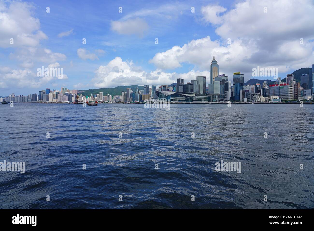 HONG KONG -29 JUN 2019- Day view the modern Hong Kong skyline near the Convention Center in Wan Chai and Central seen from the water in  Victoria Harb Stock Photo