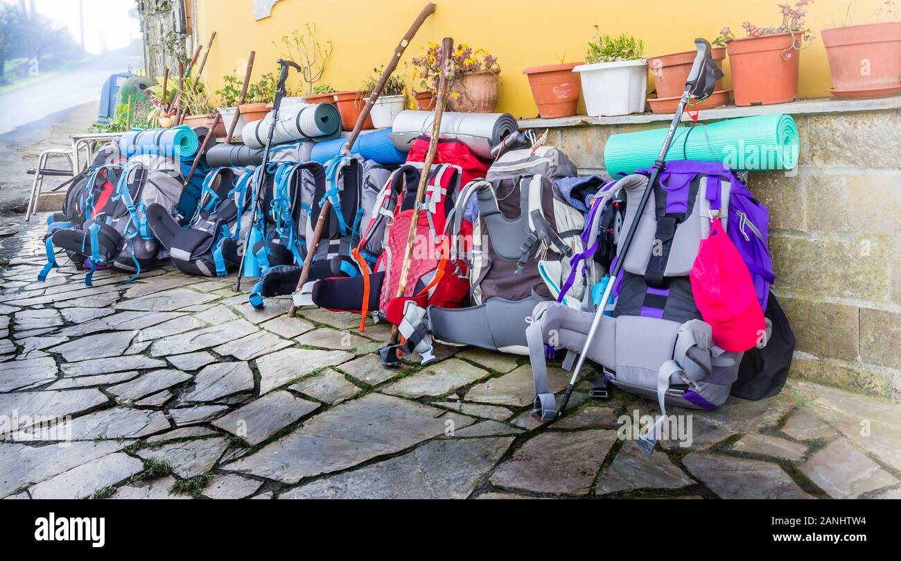 Pilgrim Backpacks and other Hiking Gear outside a Cafe on the Way of St James (Camino de Santiago) Stock Photo